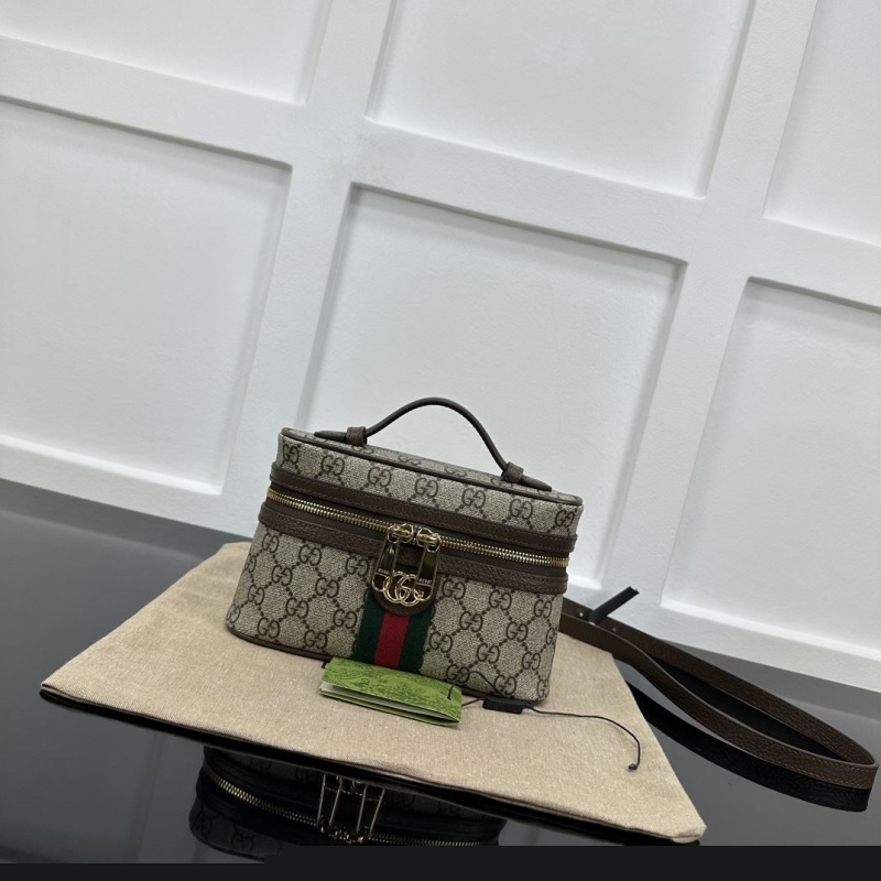 G*u*i cosmetic bags